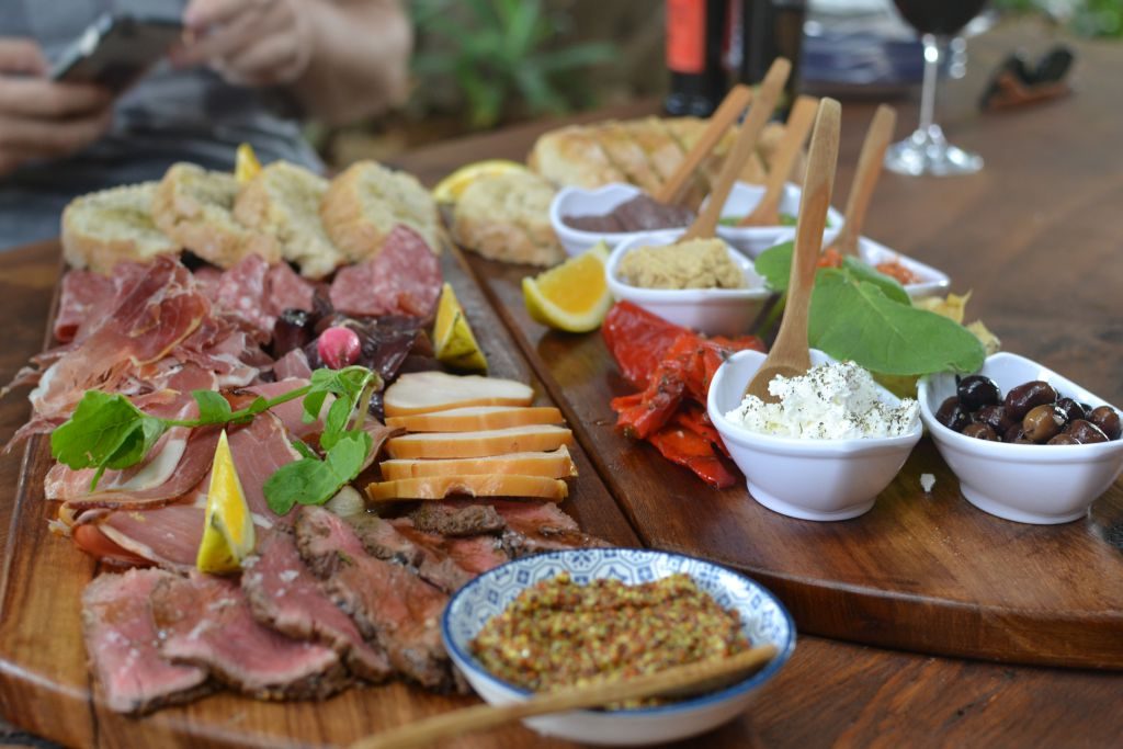 Almost Orange Bistro There’s a deer just outside eating fruit from the